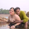 village-couple-fun-at-river