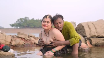 village-couple-fun-at-river